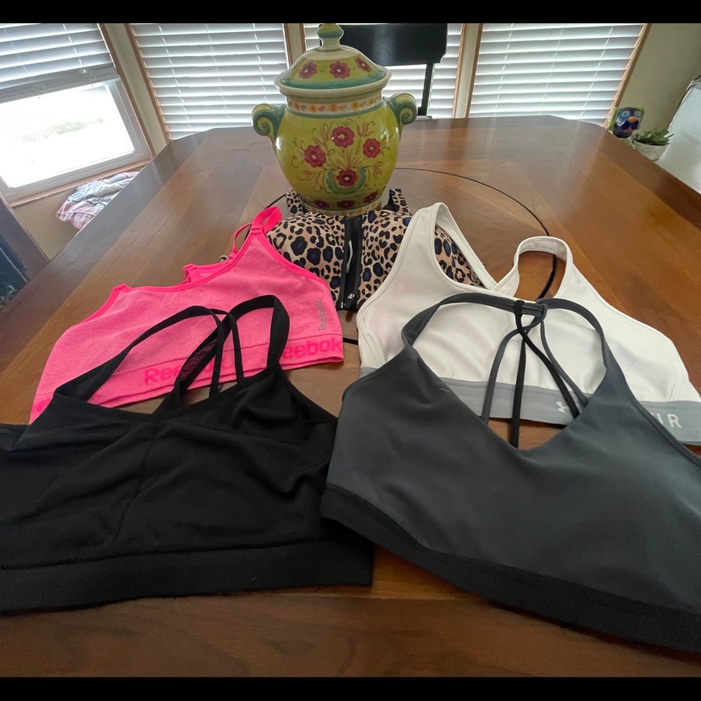 5 size large sports bras .. all like new soft and comfy … one VS is size 38 C